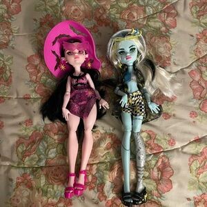 Monster High Dolls with Pink and Blue Outfits